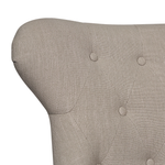 Haven Buttonback Dining Chair detail of tapered timber legs
